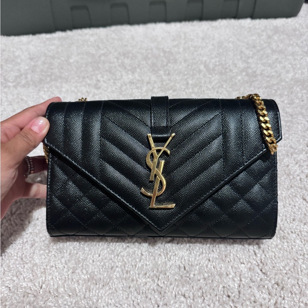 Yves Saint Laurent Black and Gold Quilted Clutch